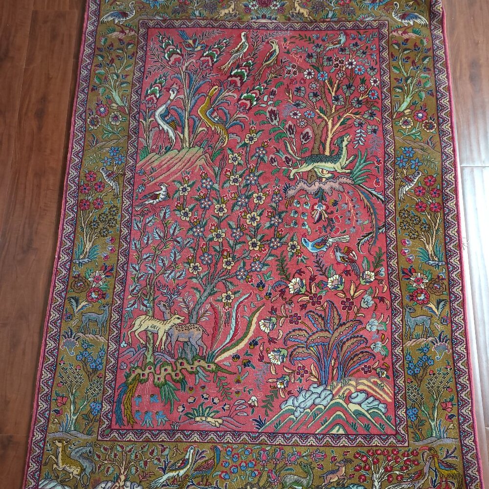 A semi-antique Ghom carpet in silk